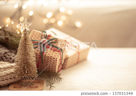 Christmas background with decorative Christmas tree on the background of Christmas decorations. Christmas background with decorative Christmas tree on the background of Christmas decorations. 137031349