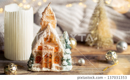 Christmas background with decorative house and holiday decor details. Christmas background with decorative house and holiday decor details. 137031353