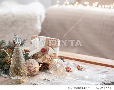 Christmas background with decor details on a blurred background, copy space. Christmas background with decor details on a blurred background, copy space. 137031364