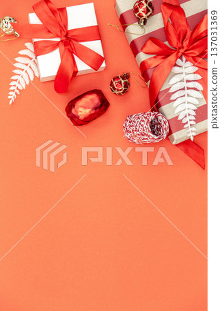 Christmas background with gift boxes and decor details, flat lay. Christmas background with gift boxes and decor details, flat lay. 137031369