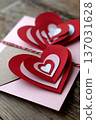 Paper hearts creating love message for valentine's day 137031628