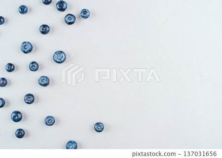 Fresh blueberries on gray background. Fresh blueberries on gray background. 137031656