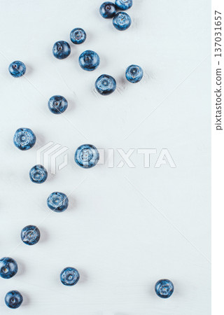 Fresh blueberries on gray background. Fresh blueberries on gray background. 137031657