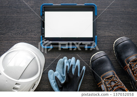 Composition with digital tablet and electrician work items. Composition with digital tablet and electrician work items. 137032058