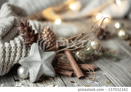 Cozy Christmas background with decorative star close-up. Cozy Christmas background with decorative star close-up. 137032162