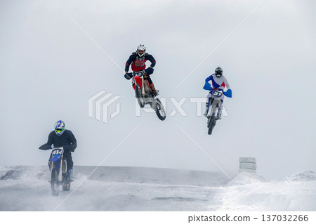 Three motocross riders 137032266