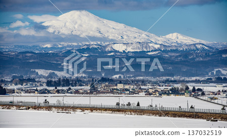 Mount Chokai and the townscape waiting for spring, Akita Prefecture Mount Chokai and the townscape waiting for spring, Akita Prefecture 137032519