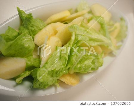 Lettuce and apple salad, my wife's home-cooked meal, dinner at home, happy family Lettuce and apple salad, my wife's home-cooked meal, dinner at home, happy family 137032695