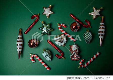 Festive Green Background with Holiday Ornaments and Text Field 137032956