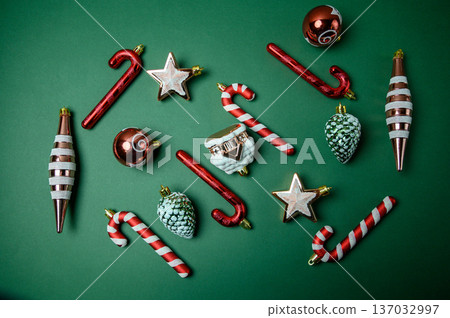 New Year Composition with Christmas Ornaments on Green Background New Year Composition with Christmas Ornaments on Green Background 137032997