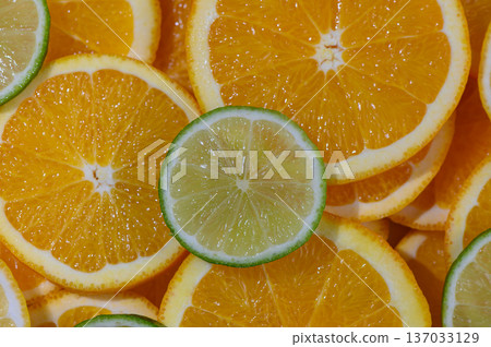 Juicy Orange and Lime Circles Food Background Juicy Orange and Lime Circles Food Background 137033129