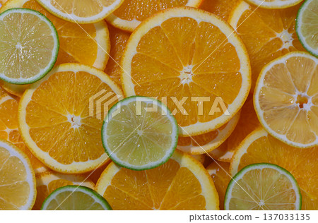Sliced Orange and Lime Colorful Food Background 137033135