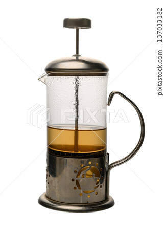 French Press with Brewing Tea Leaves Isolated on White Background French Press with Brewing Tea Leaves Isolated on White Background 137033182