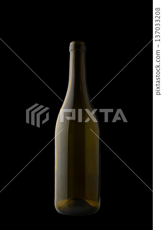 Empty Amber Burgundy Wine Bottle on Black Background Empty Amber Burgundy Wine Bottle on Black Background 137033208