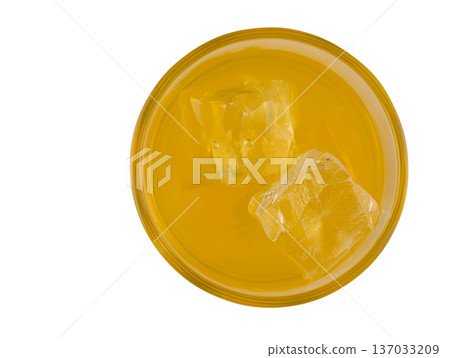 Top View of Orange Juice Glass with Ice on White Background Top View of Orange Juice Glass with Ice on White Background 137033209