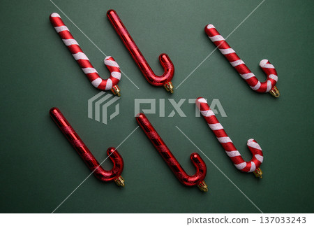Red and White Striped Candy Canes Holiday Arrangement on Green Red and White Striped Candy Canes Holiday Arrangement on Green 137033243