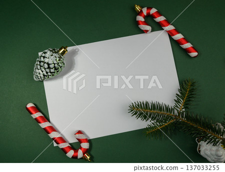 Christmas Message Card Surrounded by Candy Canes on Green Christmas Message Card Surrounded by Candy Canes on Green 137033255