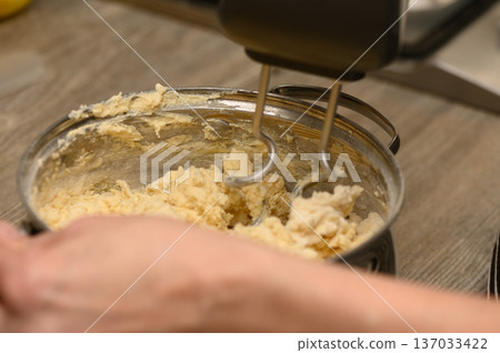 Preparing Stollen Dough Festive Holiday Baking in the Kitchen Preparing Stollen Dough Festive Holiday Baking in the Kitchen 137033422