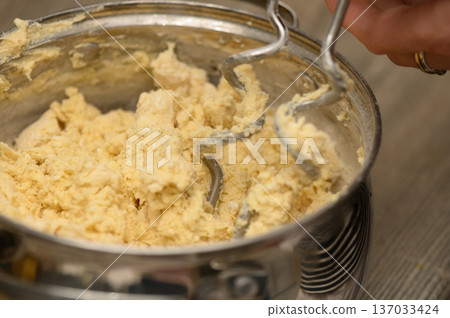 Whisking Stollen Dough Heart of Holiday Baking 137033424