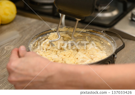 Mixing Traditional Stollen Dough Cozy Christmas Kitchen Scene Mixing Traditional Stollen Dough Cozy Christmas Kitchen Scene 137033426
