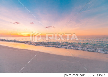 Sunset beach closeup calm ocean waves sandy shore romantic sky tropical nature Sunset beach closeup calm ocean waves sandy shore romantic sky tropical nature 137033514