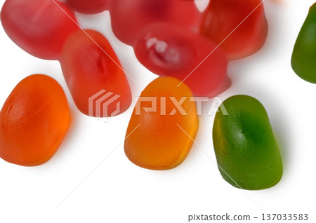 Vibrant Jelly Candies Scattered on White Background Vibrant Jelly Candies Scattered on White Background 137033583
