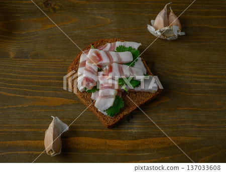 Rustic Open-faced Salo Sandwich on Dark Bread Rustic Open-faced Salo Sandwich on Dark Bread 137033608