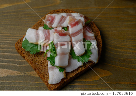 Black Bread with Salo on Old Wooden Table Black Bread with Salo on Old Wooden Table 137033610