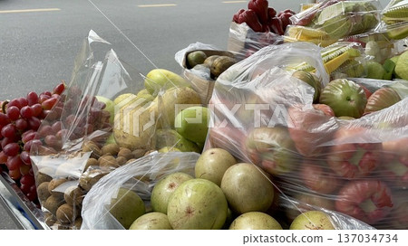 Fruits served at a street stall in Ho Chi Minh City, Vietnam 137034734