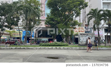 Streets and pedestrians in Ho Chi Minh City, Vietnam 137034736