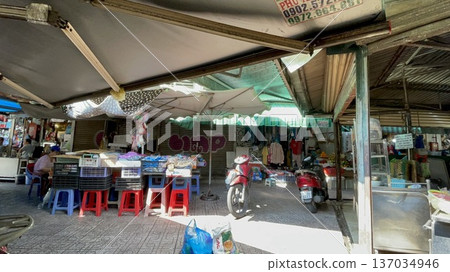 Chairs and baskets at a food stall in Ho Chi Minh City, Vietnam 137034946