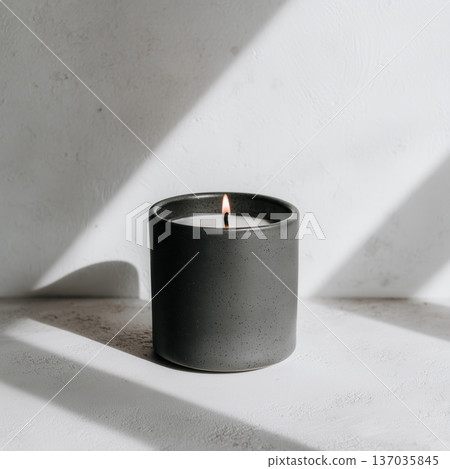 Black ceramic candle jar mockup, lit candle in styled studio environment 137035845