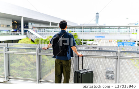 A man waiting to depart at the airport. Photo courtesy of Kansai International Airport (KIX). A man waiting to depart at the airport. Photo courtesy of Kansai International Airport (KIX). 137035940