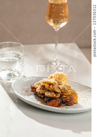 Caramelized banana dessert with ice cream 137036312