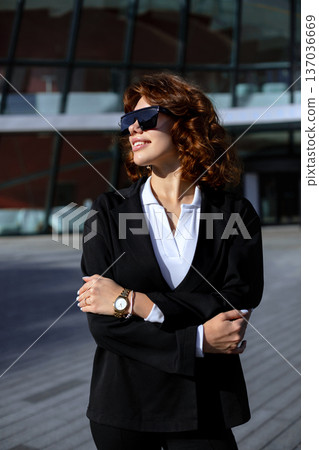 Professional Businesswoman Full Body Pose Near Corporate Office Building Professional Businesswoman Full Body Pose Near Corporate Office Building 137036669