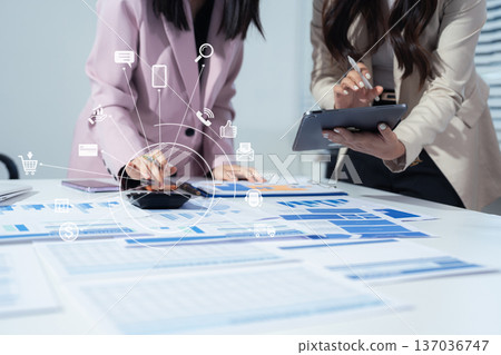 Co-workers are consultants on business documents, tax, transactions and business combinations after a bankrupt merger with a newly founded company. 137036747