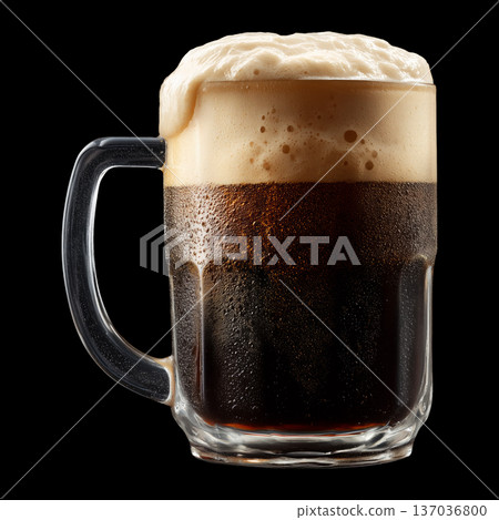 Foamy dark stout beer in a mug glass with creamy foam head, isolated on black background, concept of refreshment and taste Foamy dark stout beer in a mug glass with creamy foam head, isolated on black background, concept of refreshment and taste 137036800