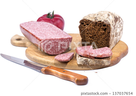 Close-up of bread and sausage on a table 137037654