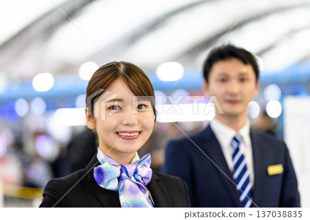 Two smiling airport staff members ■Photography cooperation: Kansai International Airport (KIX) Two smiling airport staff members ■Photography cooperation: Kansai International Airport (KIX) 137038835