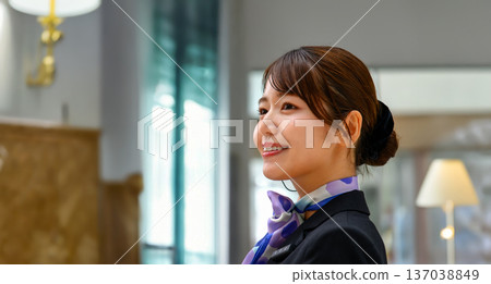 Profile of a female staff member serving customers ■Photography cooperation: Kansai International Airport (KIX) 137038849