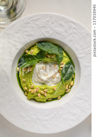 Spinach cream mousse with burrata and pine nuts Spinach cream mousse with burrata and pine nuts 137038940