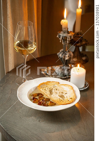 Creamy mushroom soup with toasted bread 137038981