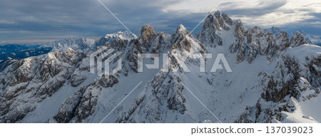 Beautiful Winter Dolomite Mountain Scenery with Man on Cross-Country Skis , Aerial View Beautiful Winter Dolomite Mountain Scenery with Man on Cross-Country Skis , Aerial View 137039023