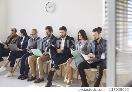 Group of candidates waiting for corporate interview in office recruitment queue 137039093