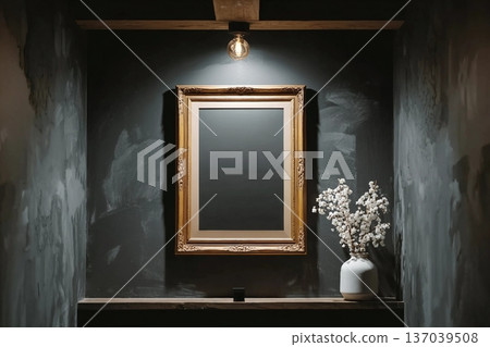 a blank poster frame mounted on a dark, charcoal-gray wall. 137039508
