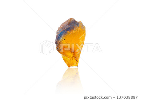 Macro mineral stone Fluorite yellow and blue color on a white background Macro mineral stone Fluorite yellow and blue color on a white background 137039887