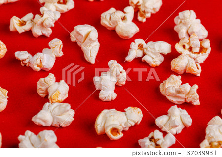 box with popcorn on a red background box with popcorn on a red background 137039931