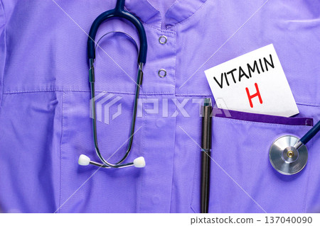 Vitamin H symbol. Concept words Vitamin H on beautiful white card. Stethoscope and pen. Beautiful medical uniform. Medical healthy lifestyle Vitamin H concept. 137040090
