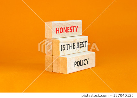 Honesty is the best policy symbol. Concept words Honesty is the best policy on beautiful wooden blocks. Beautiful orange background. Business honesty is the best policy concept. Copy space. Honesty is the best policy symbol. Concept words Honesty is the best policy on beautiful wooden blocks. Beautiful orange background. Business honesty is the best policy concept. Copy space. 137040125