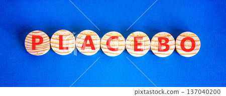 Placebo word medical symbol. Concept word Placebo on beautiful wooden circles. Beautiful blue background. Business placebo word medical concept. Copy space. 137040200